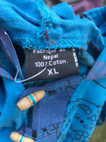 Polerón de algodón hecho en Nepal talla XL. Tela delgada. - www.eltercerojo.cl