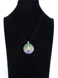 Colgante Intencionado Protección Buda Gautama (Siddharta). Color piedra turquesa y lapislázuli. Arte Tibetano. - www.eltercerojo.cl