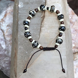 Pulsera hueso de Yak con símbolo Om. - www.eltercerojo.cl
